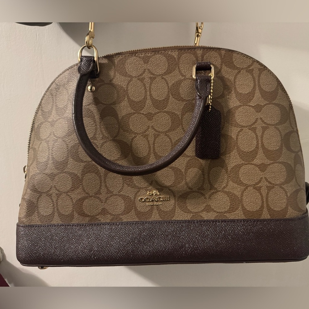 Coach leather handbag in brown with burgundy